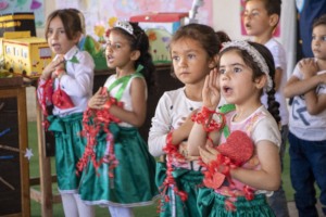 Children singing - helping with emotional healing