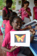Falande shows her silk screening artwork