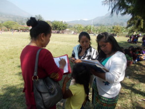 Women signing up for the FPC project