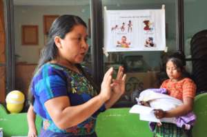 Rebeca addresses participants