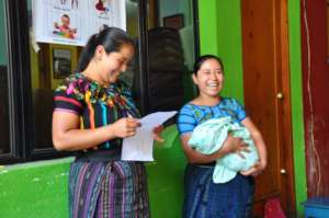 Two mothers participate in the workshop