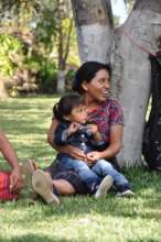 A sponsored mother enjoys the festivities