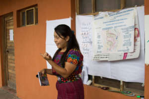 Rebeca leading a training on reproductive health