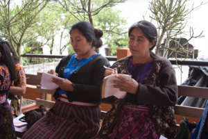 Champions taking notes during the trainings