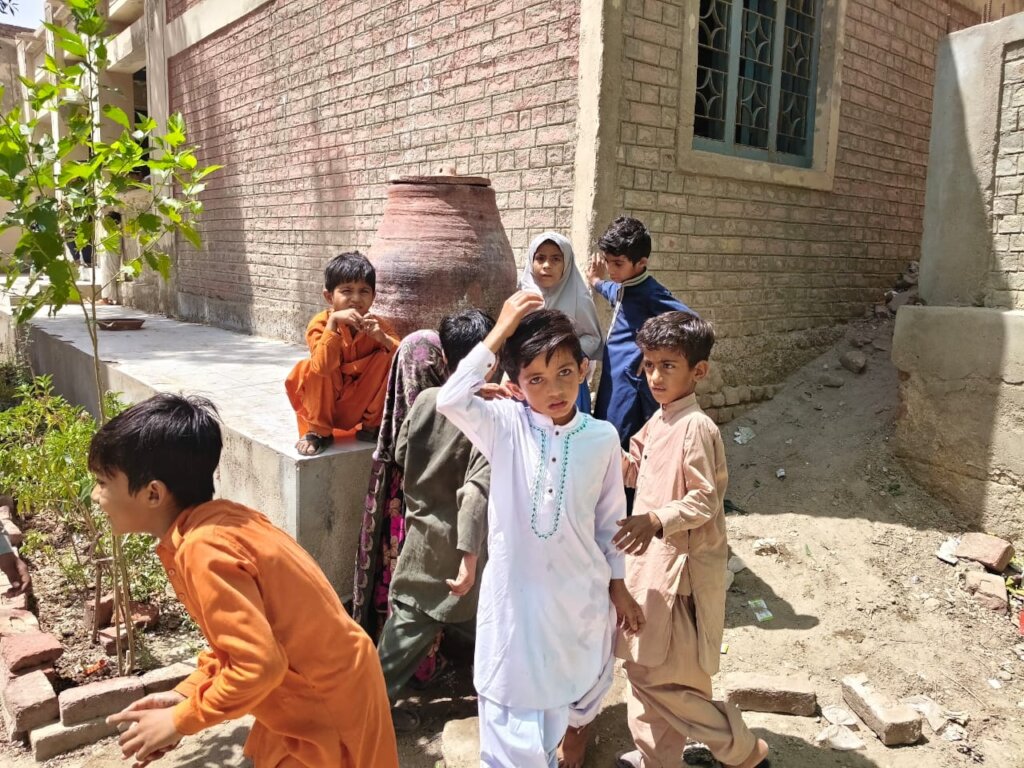 Water Container placed school are in use of Studen