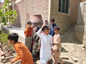 Water Container placed school are in use of Studen