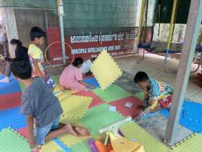 Children forming the carpets