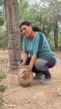Bernarda and her tinaja to collect water
