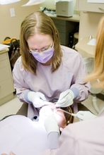 Dr. Bozzetti with a child in the clinic