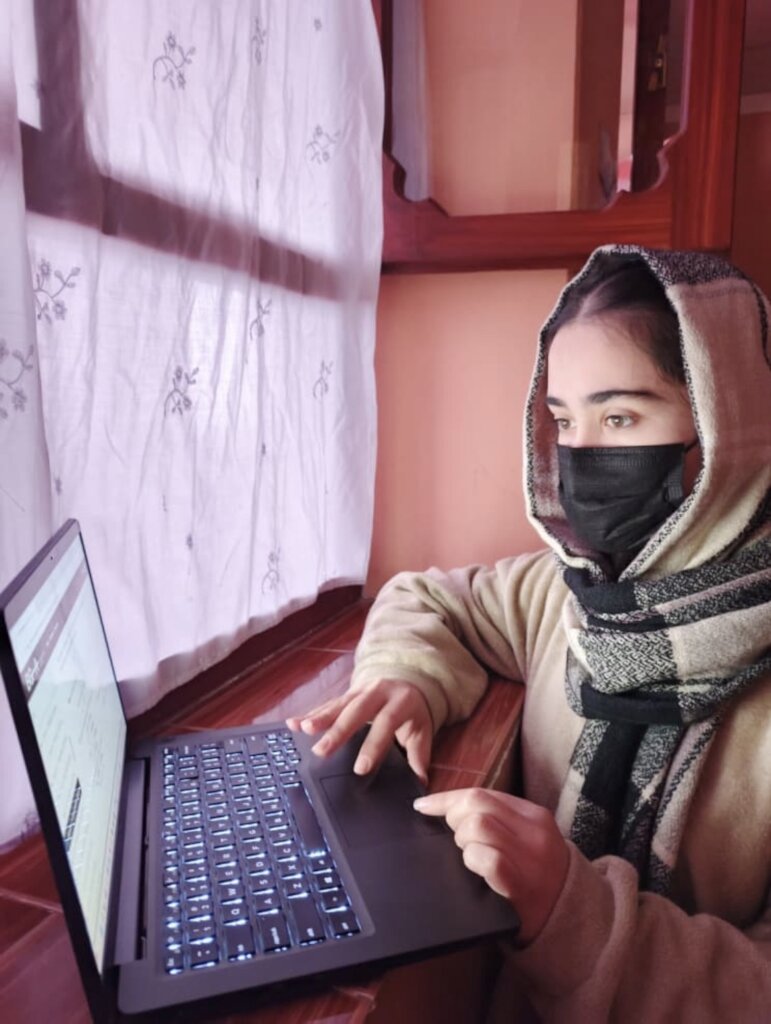 HerRight Student with new laptop device.