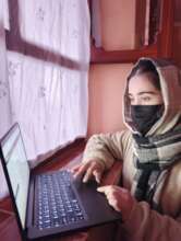 HerRight Student with new laptop device.