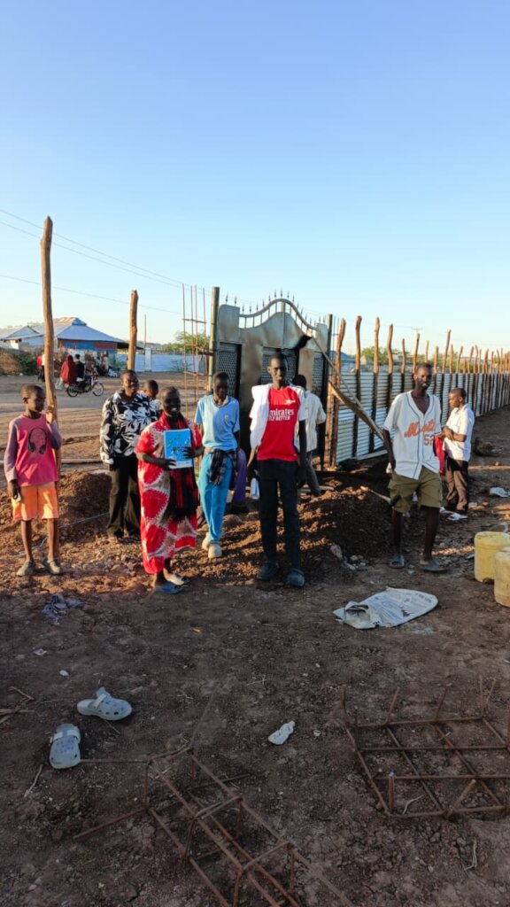 Learners in front of the gate