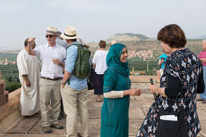 Jamila interacting with visitors to Dar Taliba