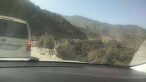 Aid vehicles clog damaged roads to Imegdale 11 Sep