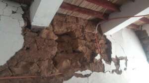 Damaged home in Amazer village