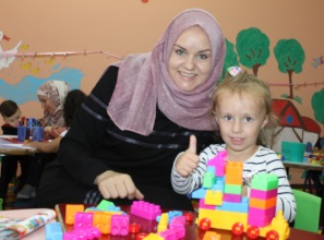 Dana and her mom are loving Lego time!