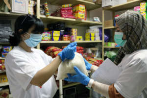 TYO staff organise food deliveries to families