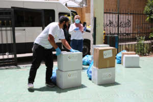 TYO staff organise food deliveries to families