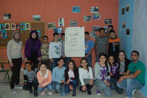 The photo class thanks Hassan for his visit!