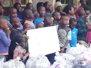 Donating educational and basic needs support to or