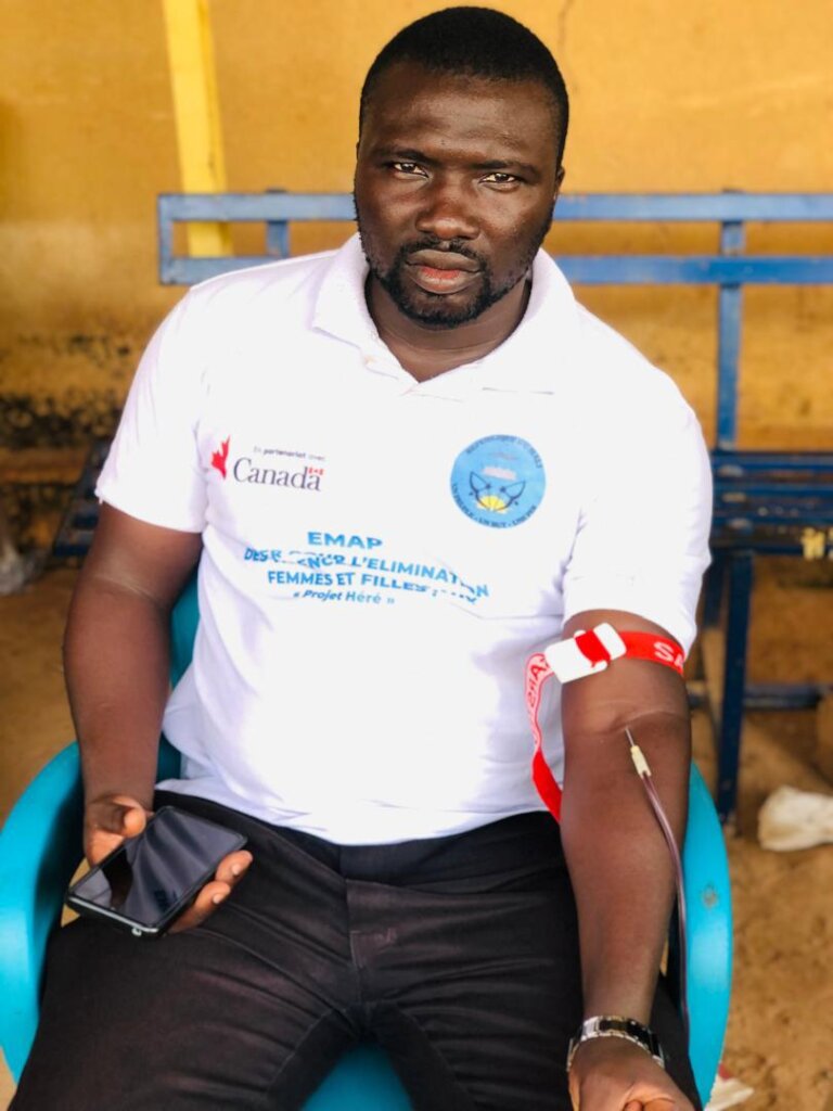 A volunteer donating blood during campaign