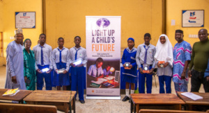 GSS Karshi Students Holding Solar-Powered Lanterns