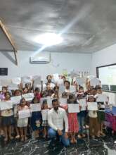 A volunteer taught the kids about architecture.