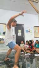 A volunteer taught about the Haka dance.