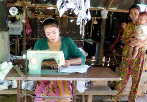 Sewing to Support Her Children