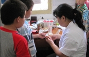 Improve Education by Improving Basic Health, China