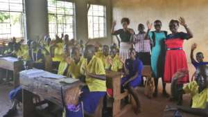 Students say hello during a CMC meeting