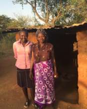 Nancy and her mother outside their home