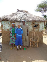 A scholar with her parents