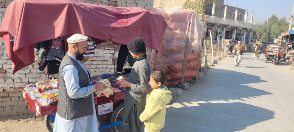 A project participant selling children's clothing