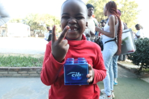 Beaming with pride after starting his savings