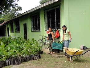 Irma and Charlyn Acosta Elizondo, hauling trees