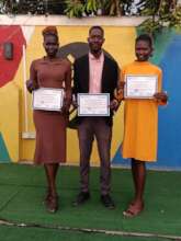 Intern Kiden Brenda poses with her certificate