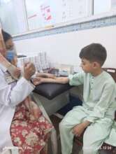 Ali Receiving emergency treatment