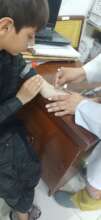 Ali Receiving emergency treatment