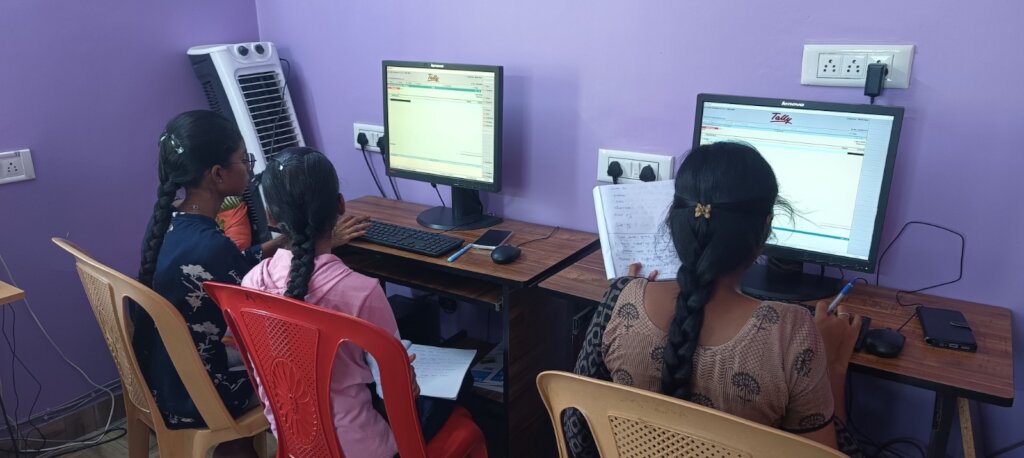 Students learning how to use Tally Accounting