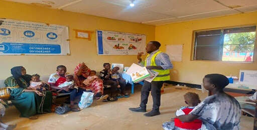 Luate, a nurse, leads nutrition education