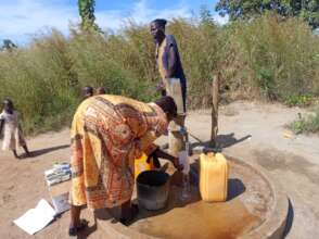 Collecting sample for water quality test
