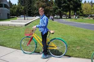 Alex with his colourful Google bike
