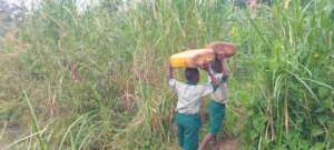 Children carrying water