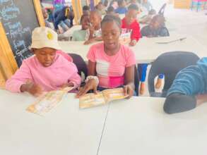 Growing young minds through reading.