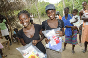 Women in Haiti receiving Safe Motherhood Kits