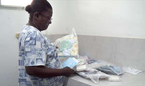 Nurse sorts SMKs during distribution