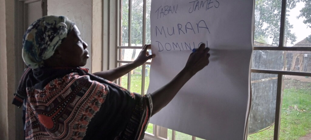 Dominica writing her Names