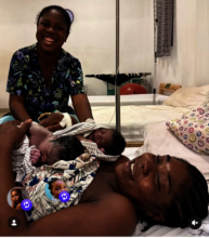 Midwife, mother and twins