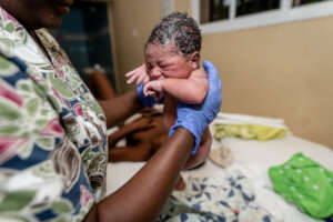 Caught into the loving hands of a midwife